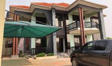6 bedroom house for sale in Kungu Najjera quarter an acre at 900m