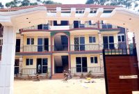 12 units apartment block for sale in Kyaliwajjala 8.4m monthly at 1.2 billion shillings