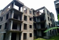 shell apartment block for sale in Kololo on 1 acre at 3.2m USD