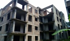 shell apartment block for sale in Kololo on 1 acre at 3.2m USD