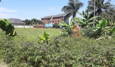 6.5 acres for sale in Bwebajja touching Entebbe road at 1 billion shillings each