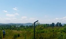 10 acres for sale in Garuga with lake view at 300m each