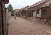 12 rooms guesthouse for sale in Bweyogerere Kiwanga at 260m