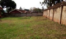 This is a 75 decimals plot of land for sale in Naguru with a shell house right off the main tarmac going for 800,000 USD