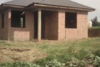 50x100ft plot of land for sale with boys' quarters at 35m