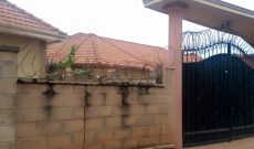 3 houses for sale in Komamboga Kyanja 30 decimals at 1 billion shillings