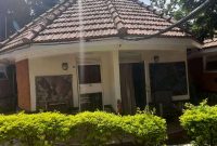Motel for sale in Entebbe 11 cottages at 800m on half acre