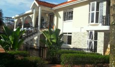 5 bedroom mansion with guest wing on 1 acre for sale in Kansanga at $1.3m