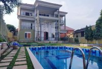 6 bedroom house with a pool for sale in Muyenga at $700,000