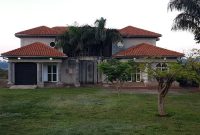 8 bedrooms lake shore house for sale in Garuga 1 acre at 1m USD