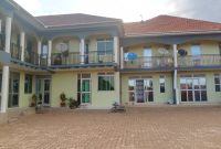 17 units apartment block for sale in Najjanankumbi 15m monthly at 1.45 billion shillings.