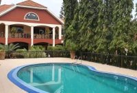 5 bedrooms house for sale in Naguru on half acre with pool at $1.4m