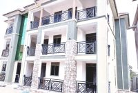 9 units apartment block for sale in Kyaliwajjala 5.8m monthly 15 decimals at 730m