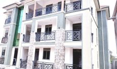 9 units apartment block for sale in Kyaliwajjala 5.8m monthly 15 decimals at 730m