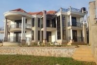 5 bedroom mansion for sale in Bwebajja 25 decimals at 1.5 billion shillings