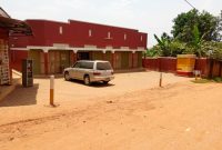commercial building for sale in Bweyogerere with shops at 280m
