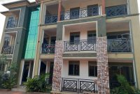 A block of 9 apartment units for sale in Kyaliwajjala at 630m