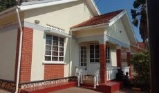 House for sale in Naguru four bedrooms, garage two servant's quarters, selling at 1b , ready title, 20 decimals