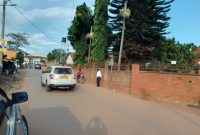 40 Decimals Commercial Plot For Sale In Kireka Kyambogo Road With House At 1.5 Billion Shillings