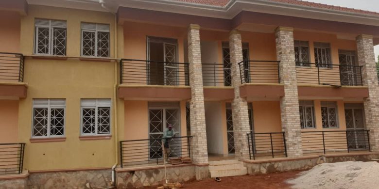 8 units apartment block for sale in Kyaliwajjala making 4.8m monthly at 700m