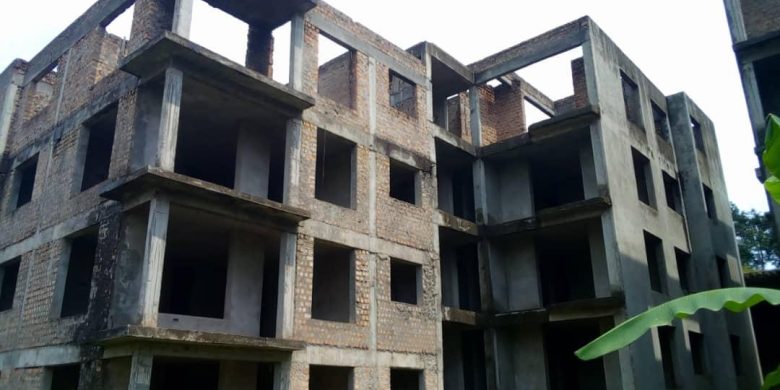 shell apartment block for sale in Kololo on 1 acre at 3.2m USD
