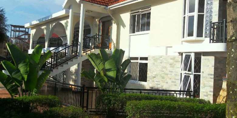 5 bedroom mansion with guest wing on 1 acre for sale in Kansanga at $1.3m