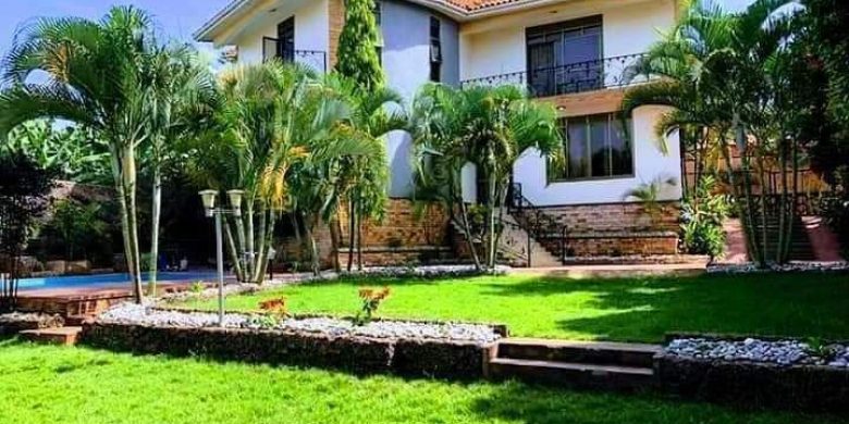 6 bedrooms house with a swimming pool for sale in Naalya 30 decimals at 1.1 billion shillings