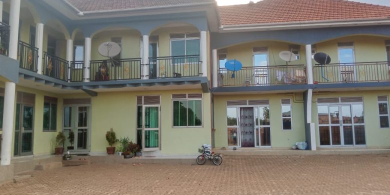 17 units apartment block for sale in Najjanankumbi 15m monthly at 1.45 billion shillings.