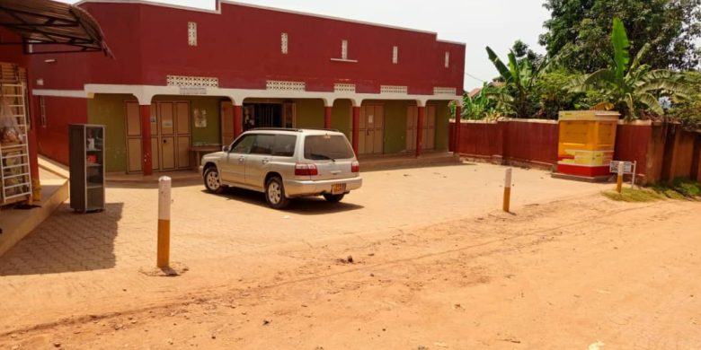 commercial building for sale in Bweyogerere with shops at 280m